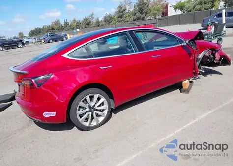 2018 Tesla Model 3 Long Range/Performance z USA, uszkodzony, nr VIN 5YJ3E1EB9JF129923